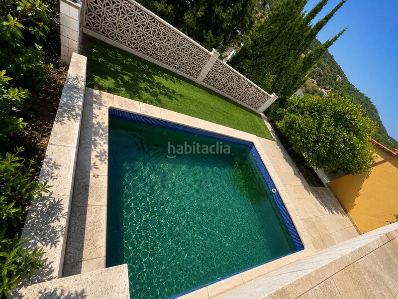 Foto f845f20a-38d5-41b8-8155-b7a796c1051e. Casa amb piscina a Niàgara Parc -Àgora Parc Tordera