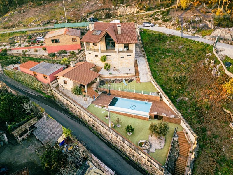 Foto f1b8e753-0404-49f2-a956-02c8fb6d85b1. Xalet amb calefacció aparcament piscina a Tui