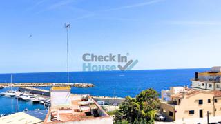 Attique à El Pedró. Ático obra nueva con vistas al puerto