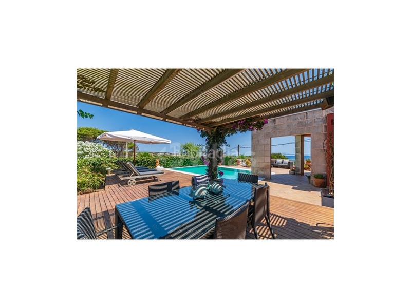 Foto 466138fb-0417-4a75-b574-4b1793f805e7. Chalet excepcional chalet en punta prima en Biniancolla-Punta Prima Sant Lluís