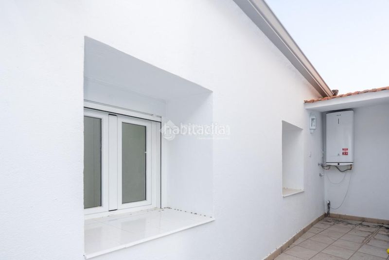 Foto 5268890d-e8a0-4a86-b32b-922339011d61. Casa aparellada amb aparcament a El Olivar-La Magdalena Colmenar Viejo