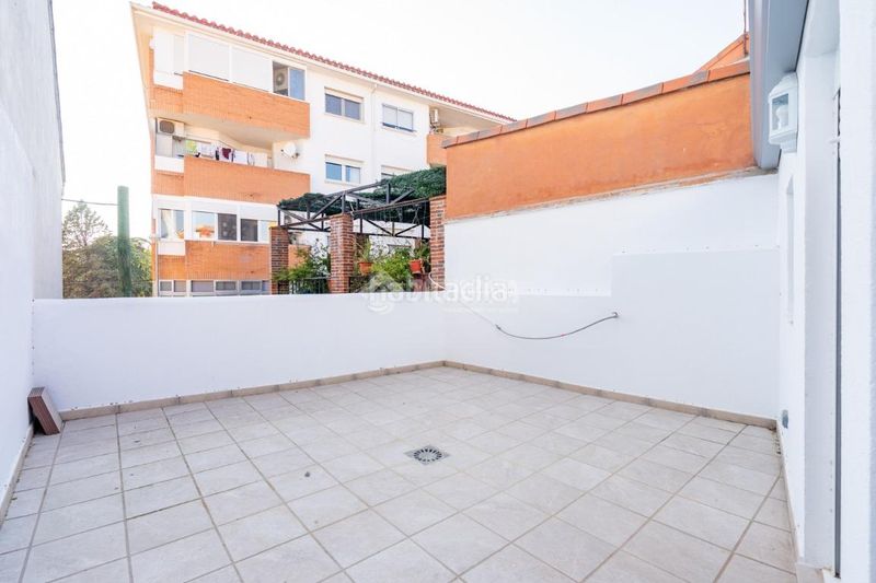 Foto c6c476ab-91e5-4520-b72f-349841a31365. Casa aparellada amb aparcament a El Olivar-La Magdalena Colmenar Viejo