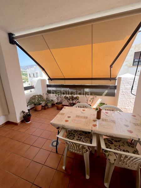 Foto cd75d6cf-fbe6-41e0-89b5-de1933abb724. Piso  reformado en oasis con 2 dorm., terraza, 2 baños, garaje doble, trastero, piscina, jacuzzi, sauna y gym. amueblado! en Salobreña