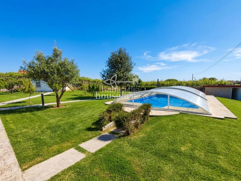 Foto 05a38c09-9569-4ee0-94f4-f5950735e34d. Casa amb aparcament piscina a Ribadumia