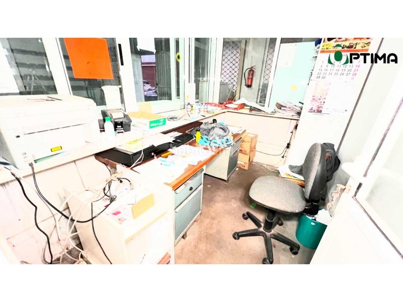Foto f1f70b03-27c0-4018-a5f7-a19f3c99f0a4. Location local commercial dans Estrada (A)