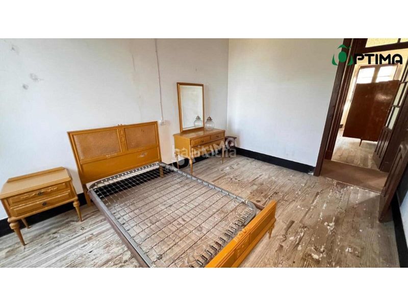 Foto bcb3c9fc-b074-4316-bfe2-7ff55be06053. Casa amb aparcament a Boqueixón