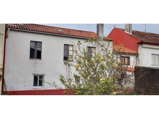 Casa aparellada a O Carril. Casa a reformar entorno de carril