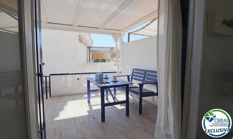 Foto 1297a62a-d8d3-4647-88e5-dc813b2c6cc8. Casa  con gran terraza al sur adosada ubicada en la zona de Sant Maurici en Empuriabrava