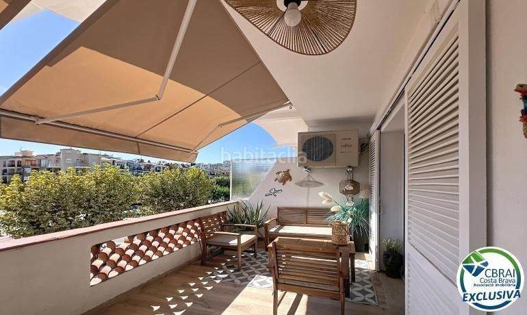 Foto ecc24f84-90b8-48cd-bab5-c09bca7509ca. Apartamento  reformado con terraza a 150 m de la playa en Empuriabrava