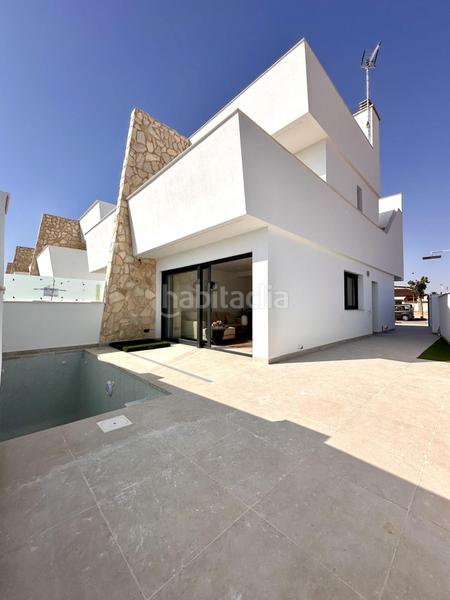 Foto c11ab30f-738d-4e02-9228-fe97c6ce62e8. Casa a schiera con parcheggio in Santiago de La Ribera San Javier
