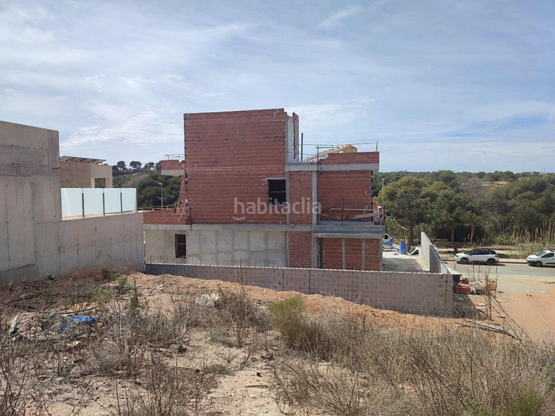 Foto ae638f55-a52d-406a-8762-f5e5609aeb2a. Chalet en Campoamor Orihuela