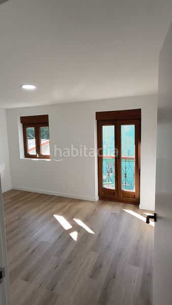 Foto ceb3f2d2-b519-403f-8bc3-e7f87afad424. Casa adossada amb calefacció a Mompia Santa Cruz de Bezana