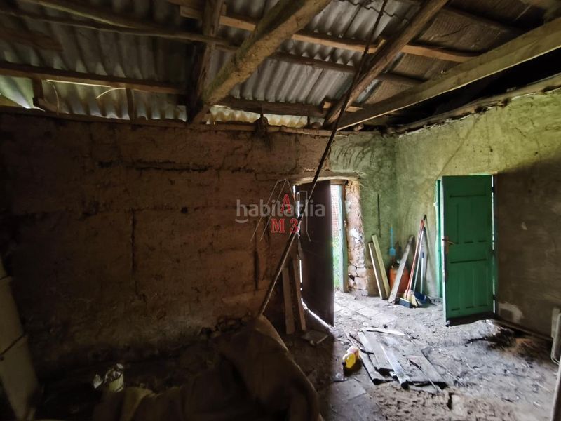 Foto 53d64bfa-3308-4ee2-9a25-9b742c0a63bf. Casa amb aparcament a Villamejil