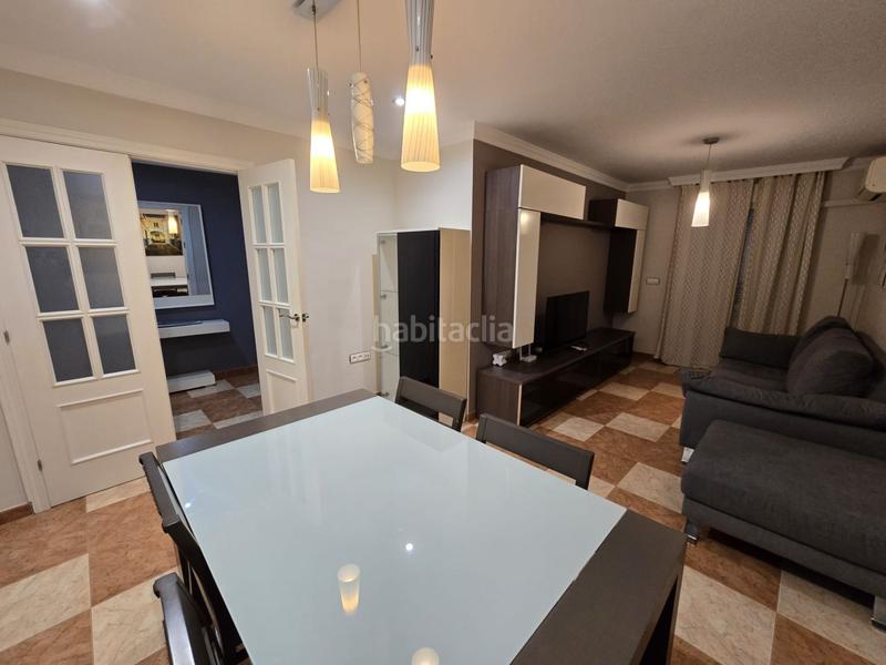 Foto 5f7160ee-9f6f-4490-896a-e8fbdce1a9db. Piso  con 3 habitaciones y plaza de garaje y licencia turistica en Motril