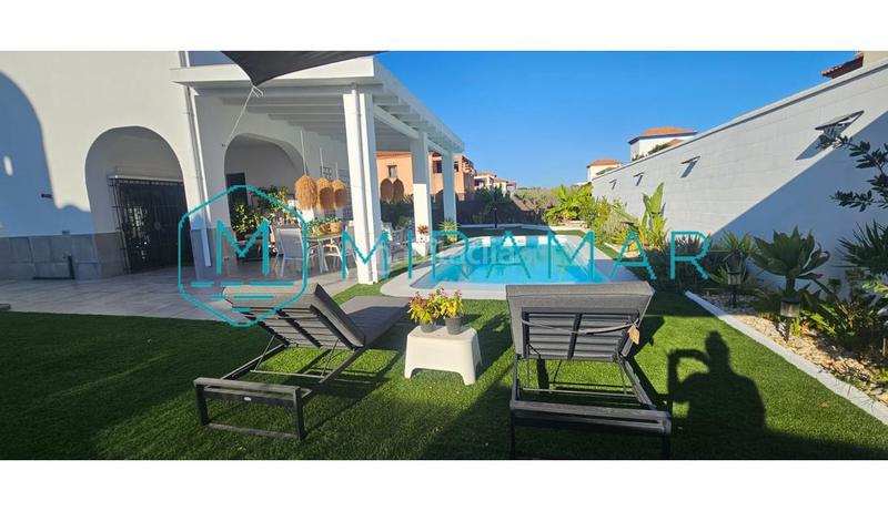 Foto 402efa55-960c-42d2-860a-cc8b484d13bb. Chalet avec parking dans Costa Esuri Ayamonte