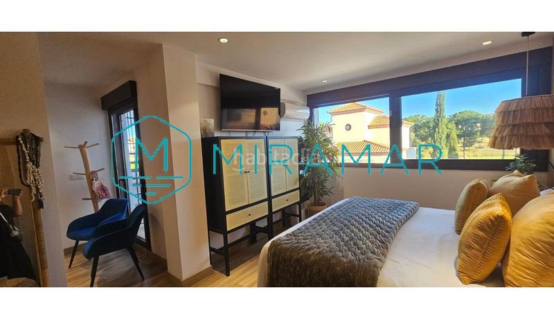 Foto 89ba20fc-4224-4540-9465-3189ea436f36. Chalet avec parking dans Costa Esuri Ayamonte