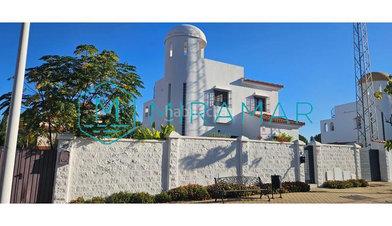 Foto db6433fb-e6b2-465b-a065-87a5b6d8a6d3. Chalet avec parking dans Costa Esuri Ayamonte