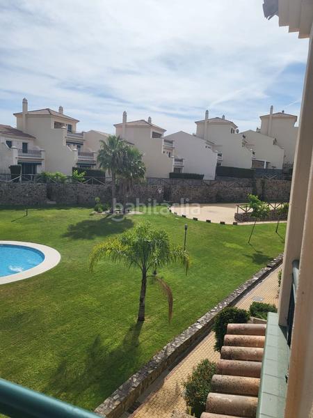 Foto 0df6cdd7-2288-436b-a3b6-595963545e69. Semi detached house with parking in Costa Esuri Ayamonte