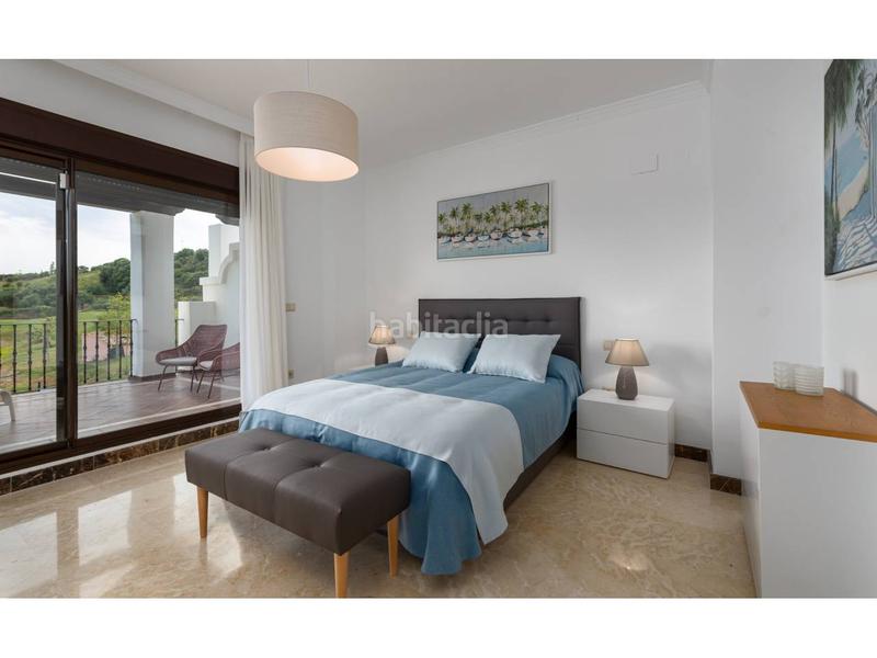 Foto 10584b01-594c-47e8-9340-8ab0fd789ab8. Casa aparellada amb piscina a Valle Romano Golf Estepona