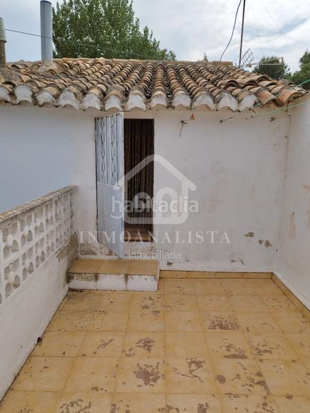 Foto 672ad202-1305-4ed1-bbc1-25c975e952c1. Casa  en calle caracuesta, campo arcís en Requena