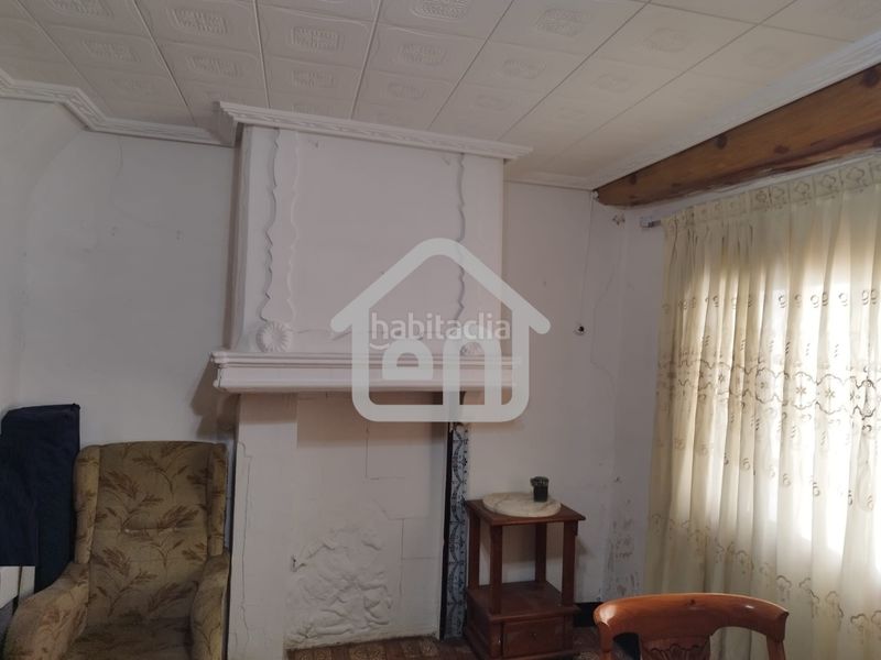 Foto 9cf96836-995d-4ada-9064-6782c2db0040. Casa adossada amb xemeneia calefacció a Requena