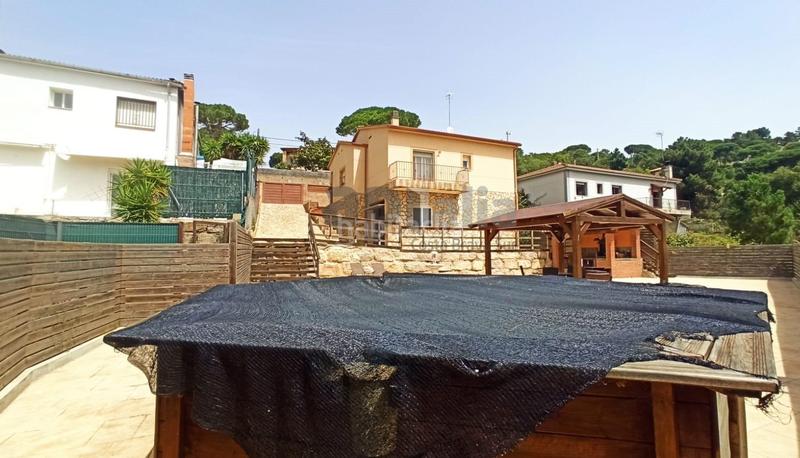 Foto c1b81543-8162-4b3f-b096-af0496d96148. Casa amb xemeneia aparcament a Aiguaviva Parc Vidreres