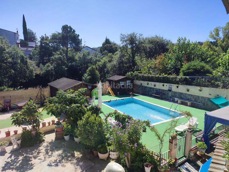 Foto 6b3722d9-4c88-4083-98e2-aa93f5a8a9c0. Casa amb xemeneia aparcament piscina a Aiguaviva Parc Vidreres