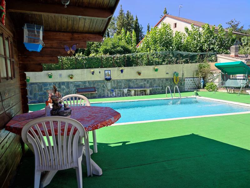 Foto 8d2c3356-0011-4fc5-a40e-15fc5302d418. Casa amb xemeneia aparcament piscina a Aiguaviva Parc Vidreres