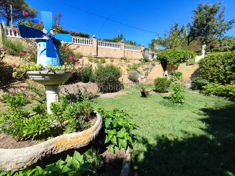 Foto fd6867c5-25b8-48c2-a6b3-652c05d575cc. Casa amb xemeneia aparcament piscina a Aiguaviva Parc Vidreres