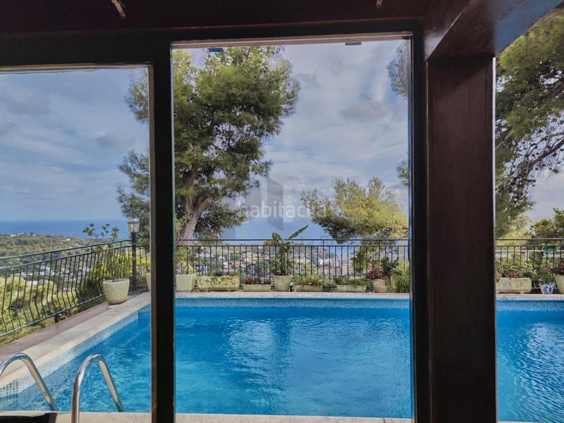 Foto 5bc3f98c-0e76-4a19-9d9e-00d5f5670b02. House with fireplace heating parking pool in Roca Grossa Lloret de Mar