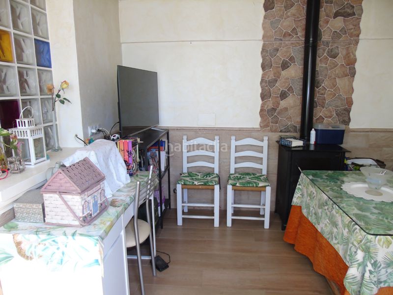 Foto eab5bce9-10d0-4b1e-9354-7b5fd4a33081. Casa aparellada amb xemeneia aparcament a Ceutí