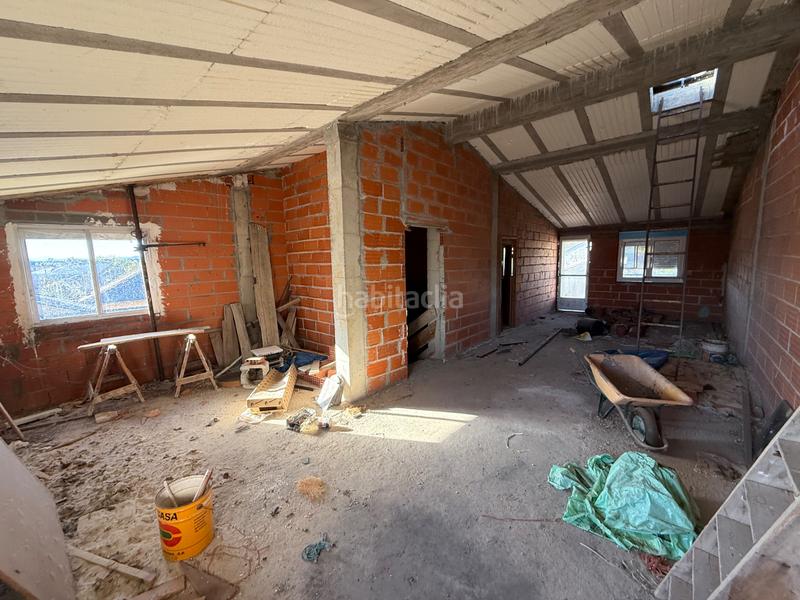 Foto 041883cc-94bb-4553-986f-f40d9336df6c. Reihenhaus mit heizung parking in Cubillos del Sil