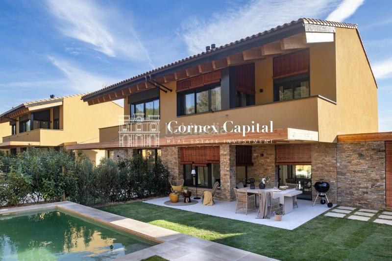 Foto b4085e3e-0282-41f5-88d8-68ebb727f991. Casa adossada amb calefacció aparcament piscina a Pals