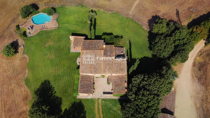 Foto e61e3e15-e64c-4e10-b732-2f7963a4c7e1. Bauernhof mit parking pool in Cassà de la Selva