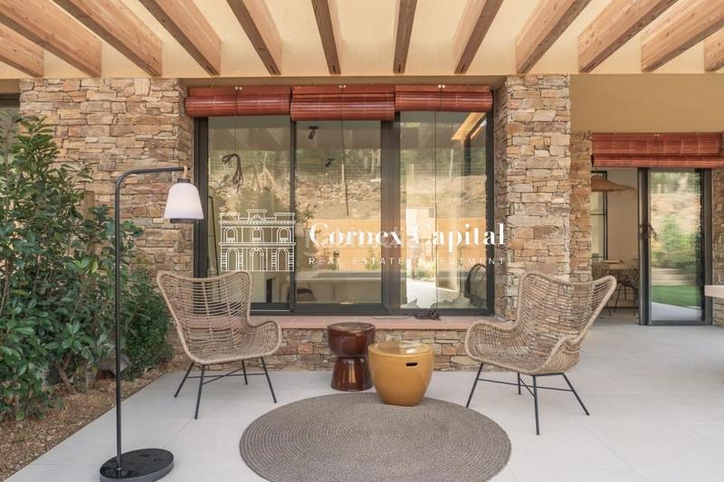 Foto c0eaf58b-88d0-4f3f-9dcf-150c28f29bbb. Casa adossada amb calefacció aparcament piscina a Regencós