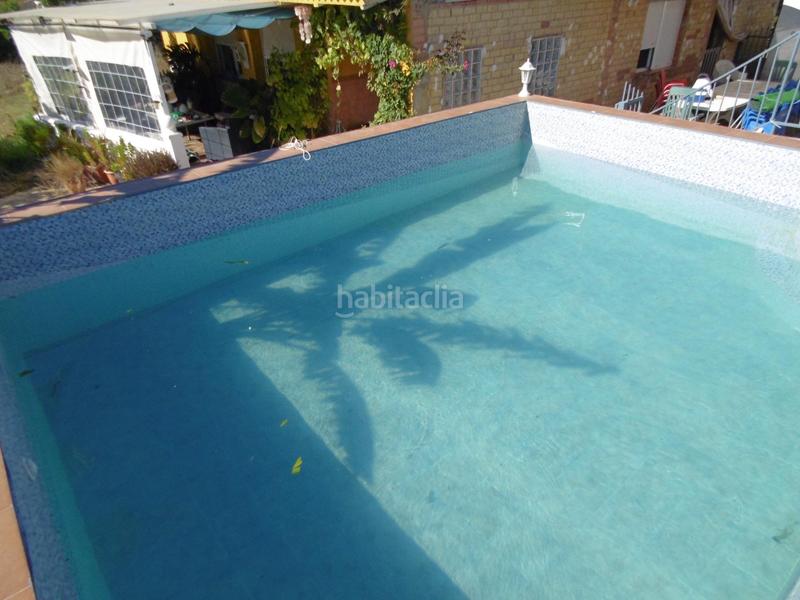 Foto 208df838-4dec-47c8-aed3-67a15b4f71c4. Casa con piscina in Núcleo Urbano Aljaraque