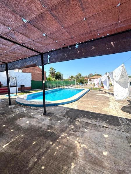 Foto 3c4d516f-fd0a-4fb0-984e-f914b5b3b813. Chalet tu nuevo hogar te espera en Villaverde del Río