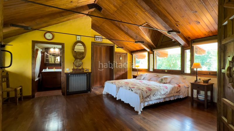 Foto f6e22247-3e6b-4f9a-a2a7-74e4d92fb1d9. Casa con camino riscaldamento parcheggio in Benasque