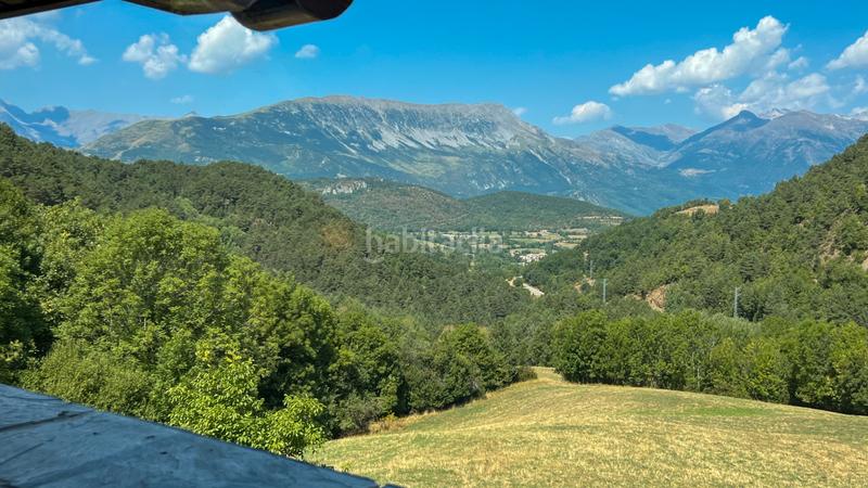 Foto cd7c6af4-24c6-4135-ab8f-62981635dbea. Casa amb xemeneia calefacció aparcament a Benasque