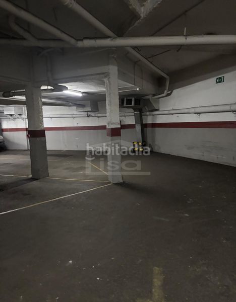 Foto d197f173-3527-4085-9789-98f526f8cb59. Motorcycle parking in carrer de la indústria 89 in Barcelona