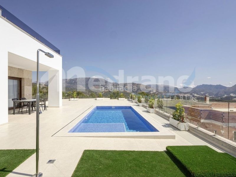 Foto 5e9a25b4-9613-4ef8-a6ad-fbd3fcd1952a. Casa amb calefacció aparcament piscina a balcón de ponoig - Polop paradis - Polop hills Polop