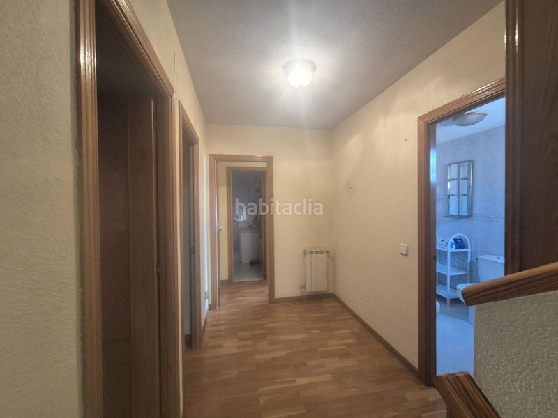 Foto 048f41cf-8d47-464e-9331-06886f37ea86. Casa adossada amb calefacció aparcament piscina a Navalcarnero