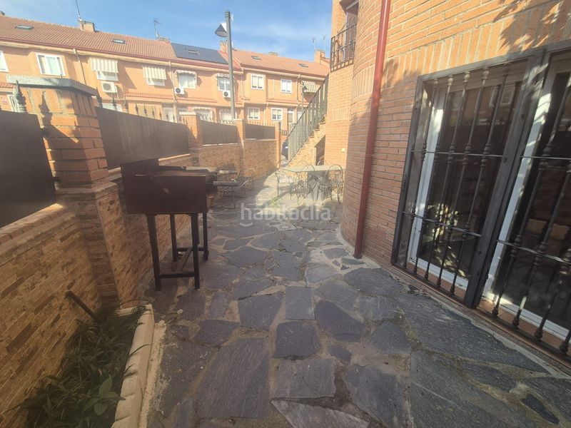 Foto 0a94b4a9-7334-4d2f-af63-f98a030f9557. Casa adossada amb calefacció aparcament piscina a Navalcarnero