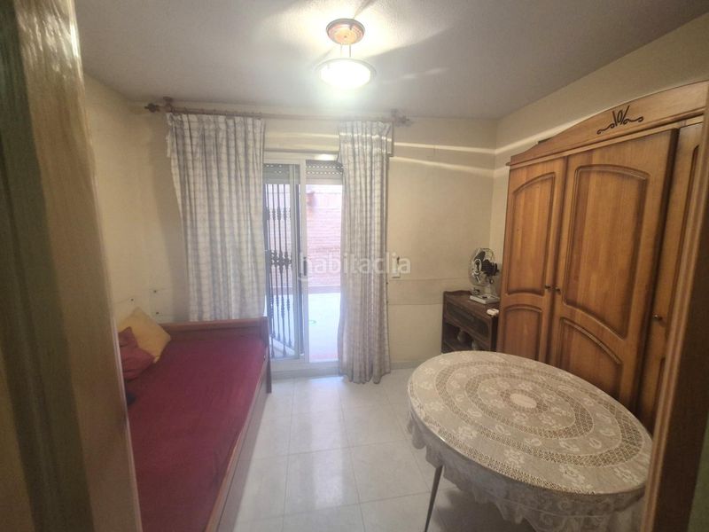 Foto 10b55fa1-6c65-47a3-81fc-4d5336d8edf5. Casa adossada amb calefacció aparcament piscina a Navalcarnero