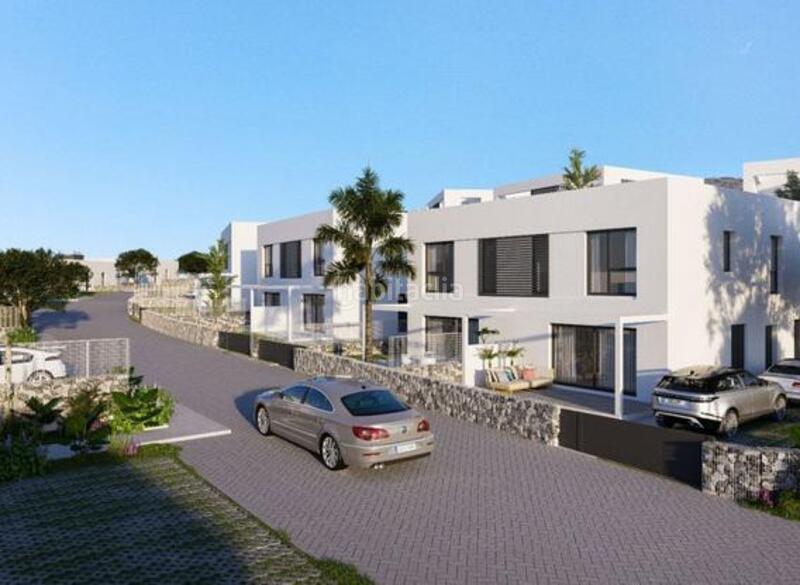 Foto bb1ac1c1-15a9-4170-bb61-f71a43387e07. Casa pareada moderno en Riviera del Sol Mijas