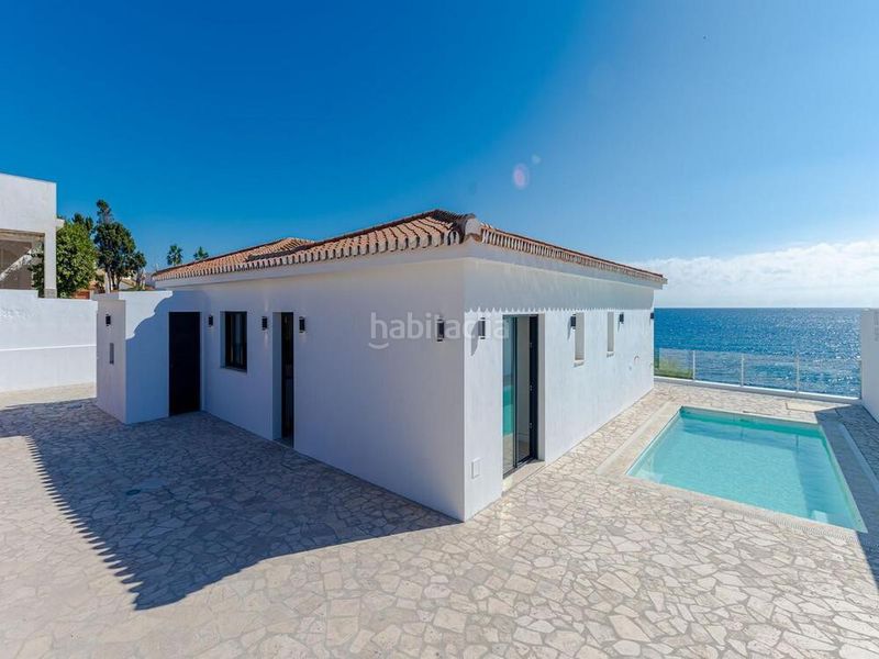 Foto b7886fda-df36-4b14-a770-031bc440fc19. Casa amb aparcament piscina a la cala Mijas Mijas