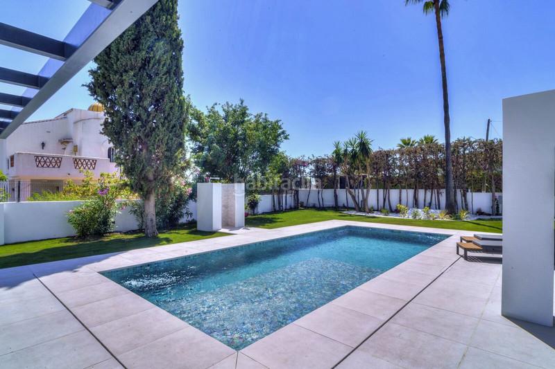 Foto 56540db8-d19c-4429-ae71-ec573cdea283. Haus mit parking pool in Elviria Marbella