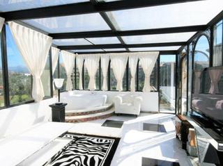 Ático en Guadalmina Alta. Ático exquisito de arte deco duplex con aspecto guadalmina campo