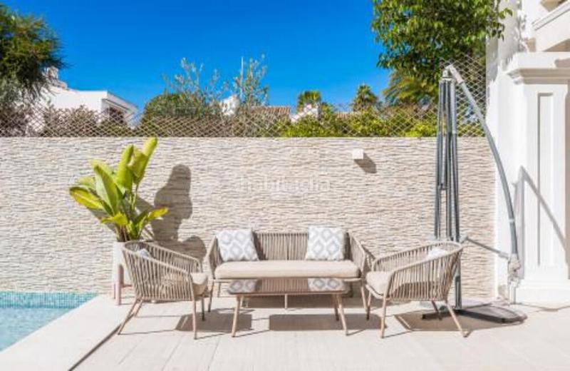 Foto 5bc366a2-745f-4ca7-ad7a-d9a15b8238c7. Casa a schiera con parcheggio piscina in Nueva Alcántara Marbella