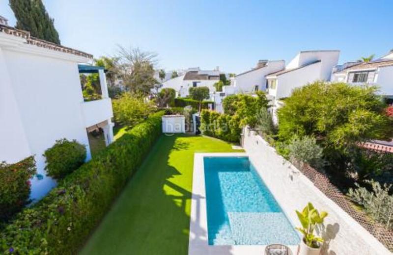 Foto c2767a91-1d66-46f9-8b62-3850c21d1a3a. Reihenhaus mit parking pool in Nueva Alcántara Marbella